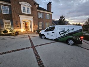 Eagle's Locksmith Cincinnati branded service truck parked at a residential home for mobile lock installation and repair.