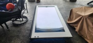 Technician repairing a stuck sliding glass patio door track in Mason OH 45040