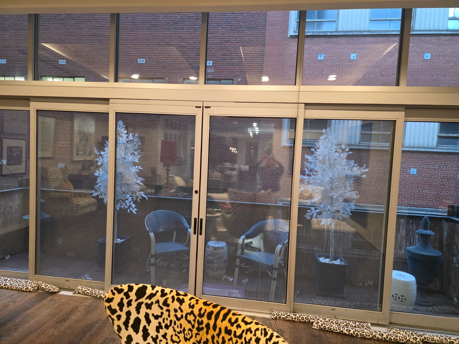 Eagle's Locksmith technician repairing a sliding glass door track in Milford OH 45150.