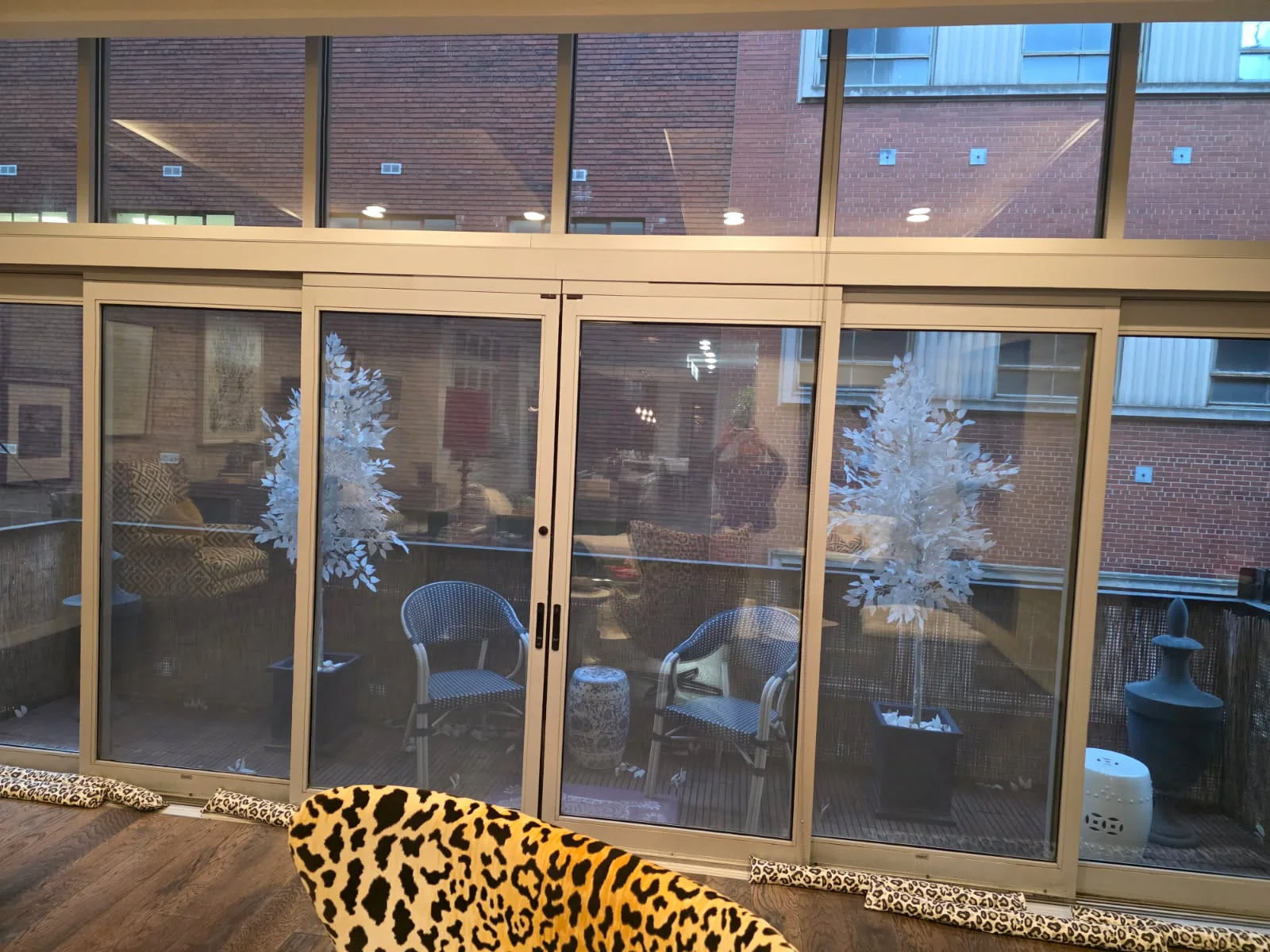 Eagle's Locksmith technician repairing a sliding glass door track in Milford OH 45150.