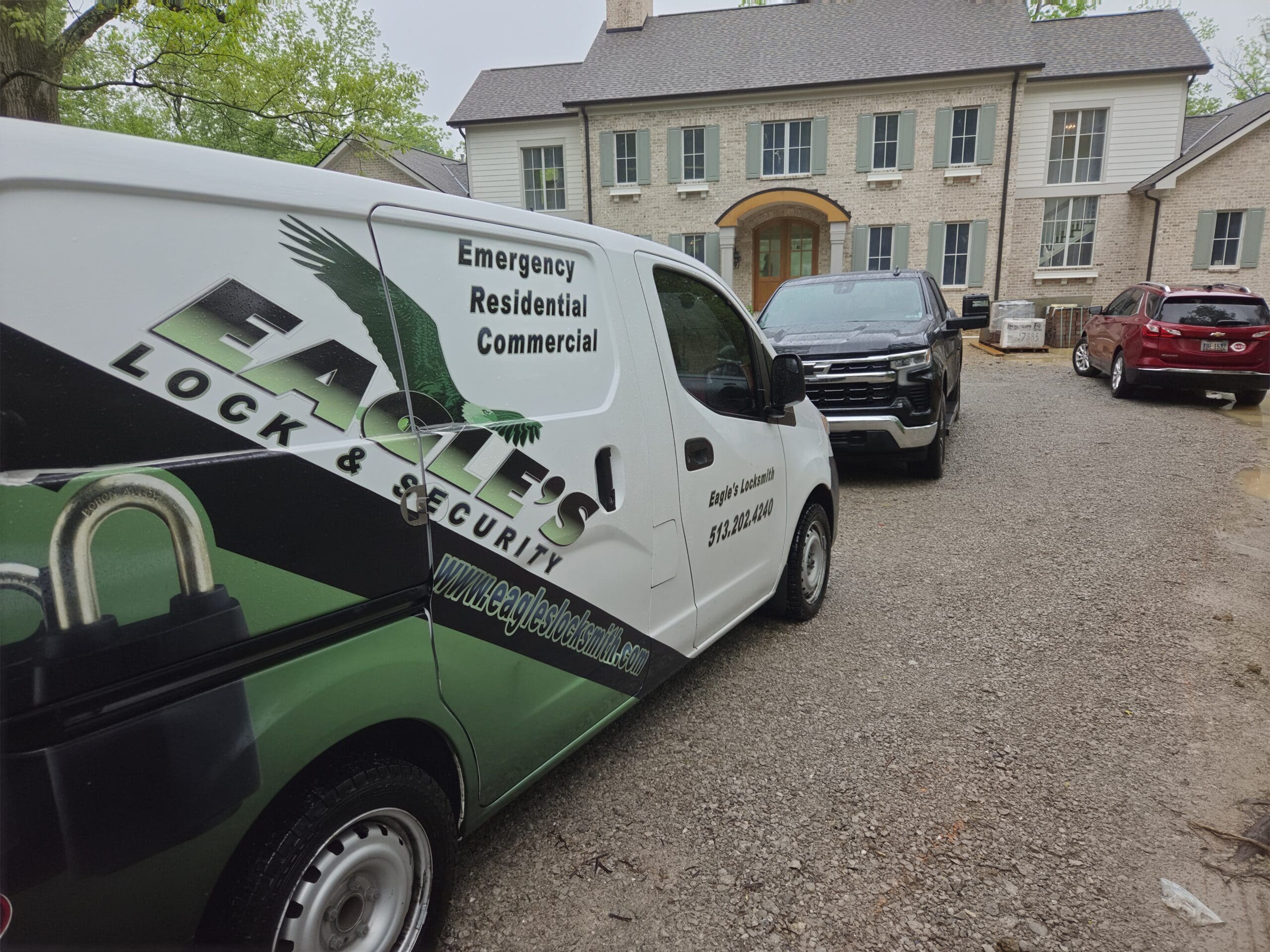 Eagle's Locksmith service van parked at a Hamilton, Ohio residential home — Emergency, Residential and Commercial locksmith services
