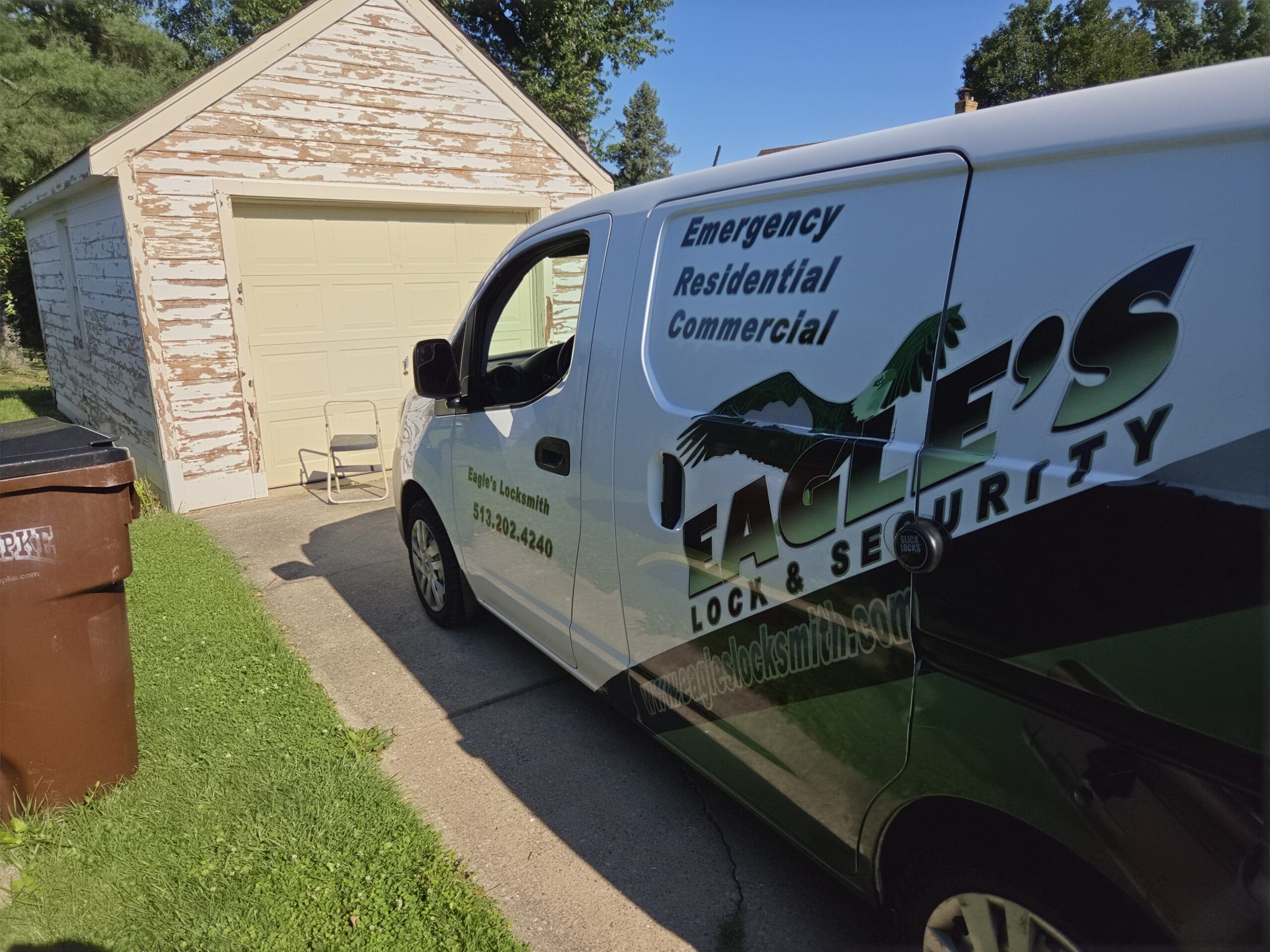 Eagle's Locksmith service truck parked outside a home in Cincinnati for a lock change