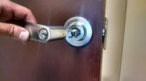 Installing The Lever Handle Lock back on the door.